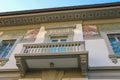 Facade with fresco of old-style design house in Viareggio, Italy