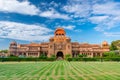 The facade and gardens of Laxmi Nivas Palac.