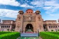 The facade and gardens of Laxmi Nivas Palac.