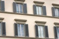 Facade of generic house with windows and shutters - Florence Italy Royalty Free Stock Photo