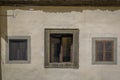 Facade of a gothic house with trompe l'oeil illusion window in Florence, Italy Royalty Free Stock Photo