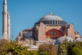 Facade of Hagia Sofia and its refulgent. cupola against the blue sky