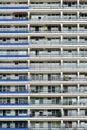 The facade of a high building with some balcony