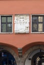 Facade of historic Old Town Hall with a decorative relief, Innsbruck, Austria