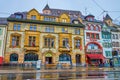 Facade of historical building on Barfusserplatz square with restaurant on the ground floor, on April 1 in Basel, Switzerland