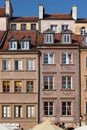 Facade of historical buildings in Old town market square in Warsaw, Poland Royalty Free Stock Photo