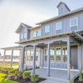 Facade of home against bright sky in Daybreak Utah