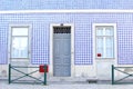 Facade house blue white mosaic tiles, Lisbon, Portugal Royalty Free Stock Photo