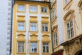 Facade of the house of classical European architecture of the old cozy tourist city. Background