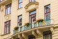 Facade of the house of classical European architecture of the old cozy tourist city. Background