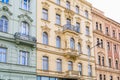 Facade of the house of classical European architecture of the old cozy tourist city. Background