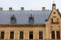 Facade of the house of classical European architecture of the old cozy tourist city. Background