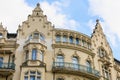 Facade of the house of classical European architecture of the old cozy tourist city. Background