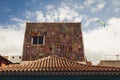 Facades of colourful houses and palm trees on typical canarian street, Puerto de La Cruz, Tenerife, Spain Royalty Free Stock Photo