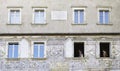 Facade of the house where the author Gianbattista Garzetti lived, Piazza Duomo, Trento, Italy. Frescoes and two people Royalty Free Stock Photo