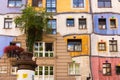 The facade of Hunderwasserhaus, designed by the artist Friedensreich Hundertwasser in Vienna, Austria.