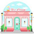 Facade ice cream shop with a signboard, awning and symbol in shopwindow Royalty Free Stock Photo