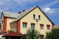 Facade of a large private house with windows on the sky background Royalty Free Stock Photo