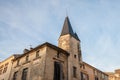 Facade of a medieval building with an old stone tower in the older town vieille ville of Libourne Royalty Free Stock Photo