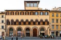 Facade of medieval house with traditional wooden shutters in Florence city, Italy Royalty Free Stock Photo