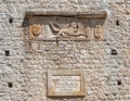 Facade of medieval Tower Revelin with relief comemorative plaque. Korcula, Croatia Royalty Free Stock Photo