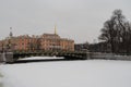 The facade of the Mikhailovsky engineers` castle and the river Moika in Saint-Petersburg