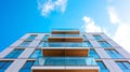 Modern apartment building with blue sky background Royalty Free Stock Photo