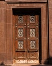 Facade of modern building. Old-fashioned brown front door Royalty Free Stock Photo