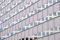 The facade of a modern building. Reflection in the facade of another building Royalty Free Stock Photo