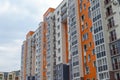 The facade of a modern building in which people live in apartments in the city center. modern new construction Royalty Free Stock Photo