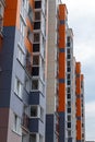 The facade of a modern building in which people live in apartments in the city center. modern new construction Royalty Free Stock Photo