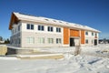 Facade of a modern commercial building shortly after its completion in winter Royalty Free Stock Photo