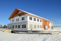 Facade of a modern commercial building shortly after its completion in winter Royalty Free Stock Photo