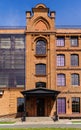 Facade of a modern loft-style office building rebuilt from an old steam mill