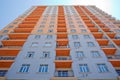 Facade of modern multi-storey new residential orange building near BAku . New apartment house . Storey houses modern . High rise Royalty Free Stock Photo