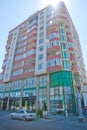 Facade of modern multi-storey new residential orange building near BAku . New apartment house . Storey houses modern . High rise Royalty Free Stock Photo