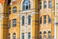 Facade of modern multistory building in classical style close-up Royalty Free Stock Photo