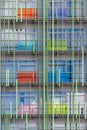 The facade of a modern residential building, an abstract architectural solution, multi-colored transparent panels. Texture Royalty Free Stock Photo