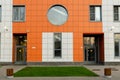 facade of a modern residential building with entrances