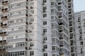 Facade of modern residential high rise building with lots of windows and apartments Royalty Free Stock Photo