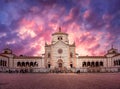 The facade of the Monumental Cemetery of Milan at dawn.