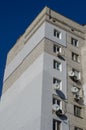 Facade of a multi-storey building with many satellite antennas Royalty Free Stock Photo