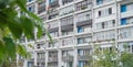 Facade of a multi-storey residential building. Many windows