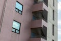 Facade of multi-story building. Fire escape staircase. Urban elements. Residential multi-storey building. Street Royalty Free Stock Photo