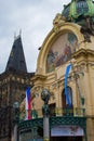 Facade of Municipal House ObecnÃÂ­ dÃÂ¯m of Prague, Czech Republic, with Powder Tower Prasna Brana at the background