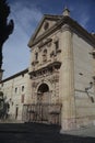 Facade of the Museo Conventual de las Descalzas museum in Antequera against a blue cloudy sky