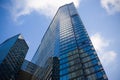 Facade of a narrow glass skyscraper