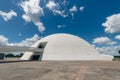 Facade of the National Museum of the Republic against a blue cloudy sky in Brasilia, Brazil Royalty Free Stock Photo