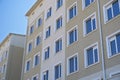 Facade of a new multi-storey building with many windows Royalty Free Stock Photo