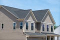 facade of a new plywood house residential window modern and shingle roof Royalty Free Stock Photo